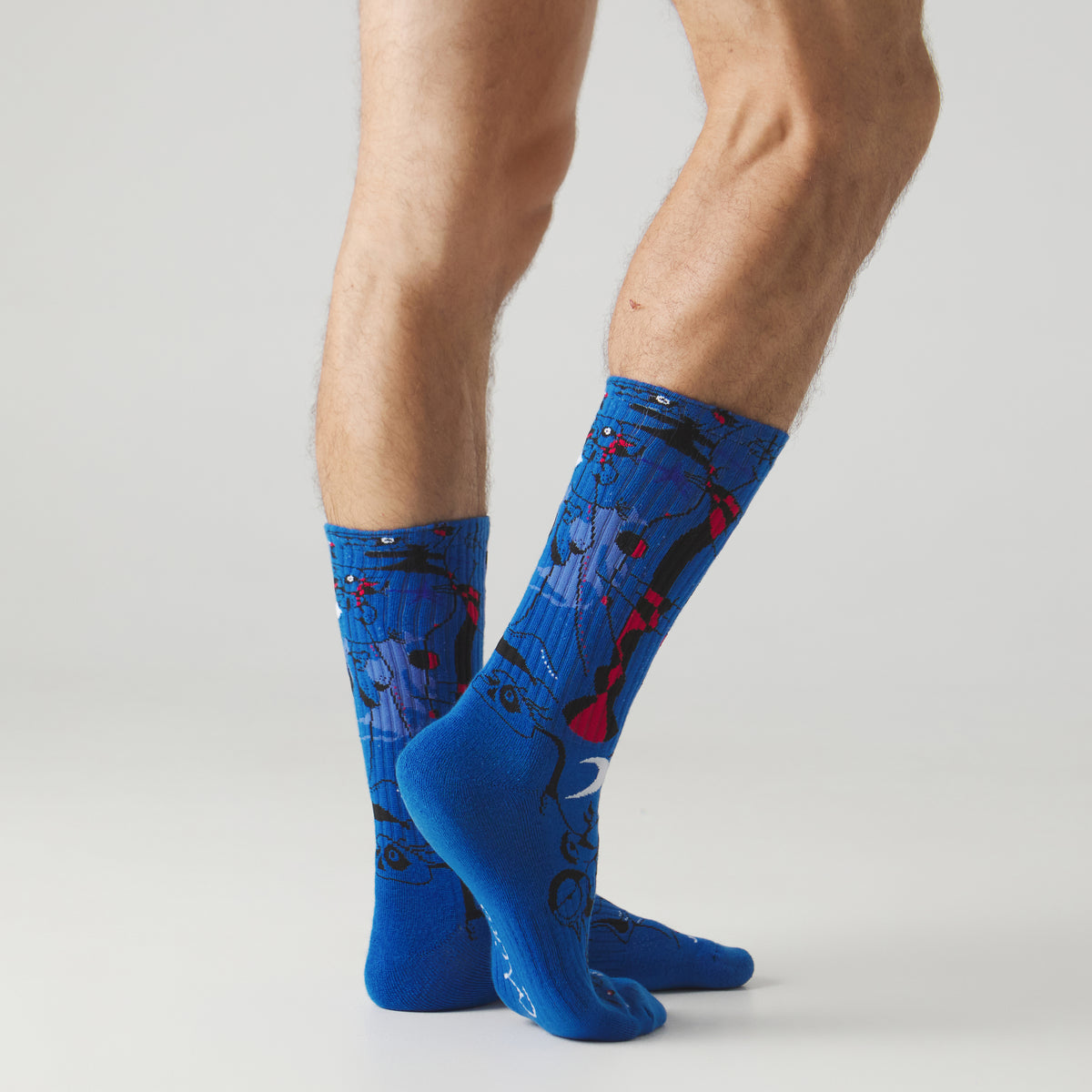 Athletic Miro Figures at Night - Azul